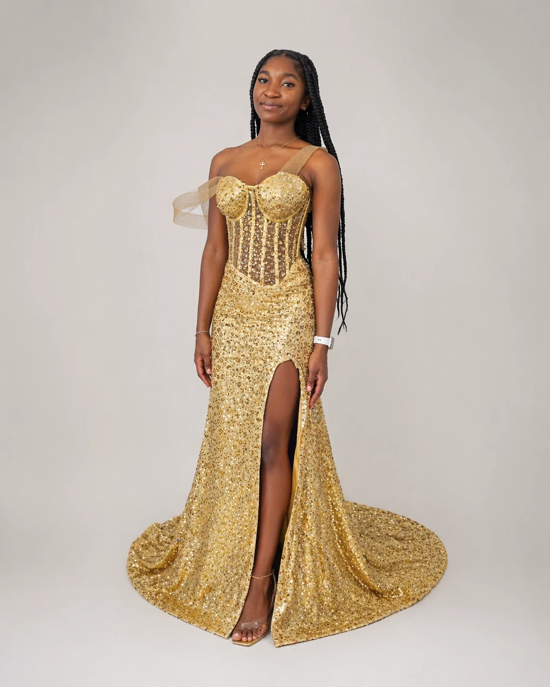 Golden Hour Zigham gold sequin evening gown worn by model