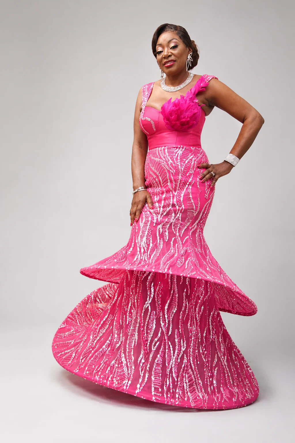 Ozzy Fuchsia Zigham sculpted mermaid gown worn by model