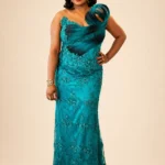 Teal Spiral Zigham beaded evening gown worn by model